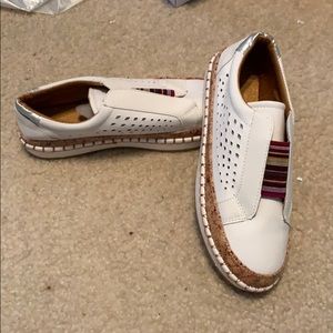 White slip on shoes